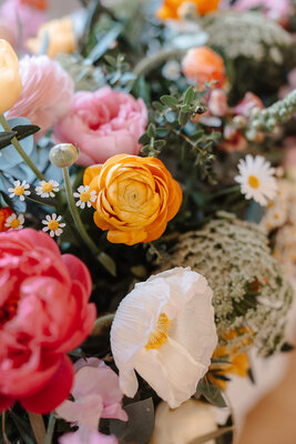 Stunning wedding breakfast centerpieces and reception flower arrangements at Hyde House